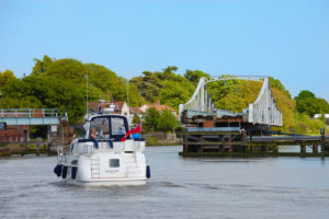 A Cruiser Approaching Reedham Swing Bridge
